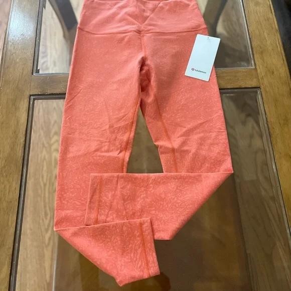 Lululemon Wunder Train High-Rise Tight 25"
Crunch Warm Coral - Picture 4 of 4
